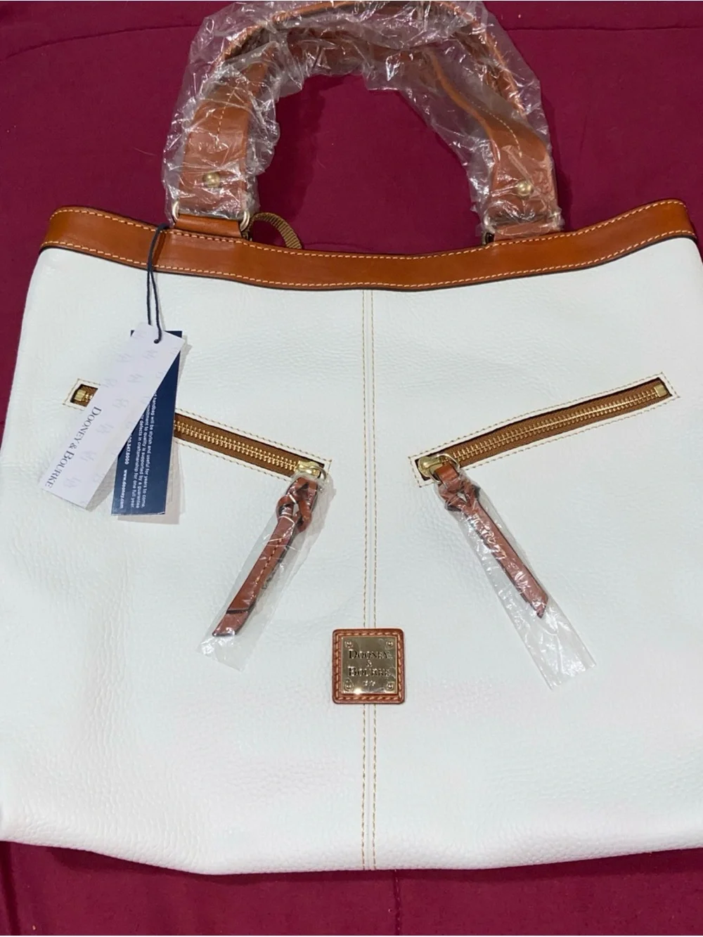 Dooney & Bourke White pebbled and Tan Leather Satchel